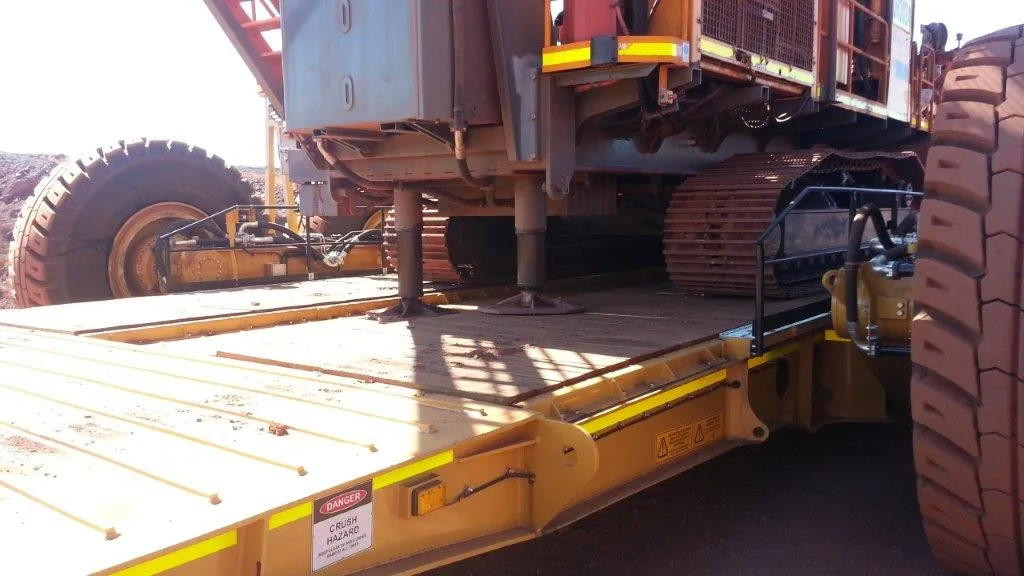 Timber deck in service on mine transport equipment